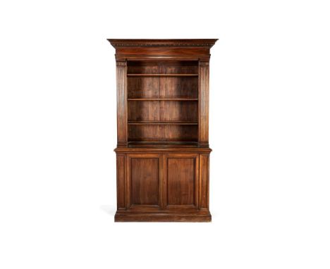 A European walnut cabinet bookcase, late 19th century, the cornice with egg and dart mouldings above three open adjustable sh