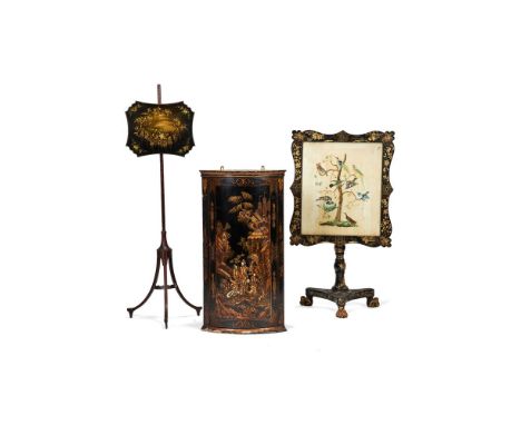 A Chinese export lacquer occasional table, early 19th century, the top with a glazed inset painted silk panel, 74cm high, 67c