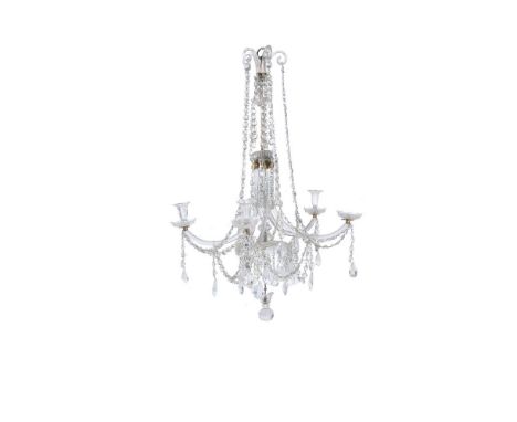 A cut-glass four light chandelier, 19th century, composite, with vase-shaped shaft and hung   overall with pendant drops (inc