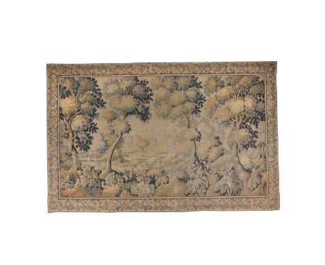 A verdure tapestry panel in Aubusson style, 20th century, depicting a wooded landscape, 225cm high, 380cm wide   This lot is 