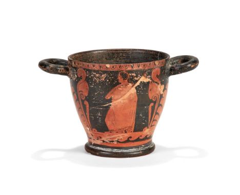 A Greek red-figure skyphos, one side decorated with a nude male holding a thyrsus, the other side with a himation clad male, 