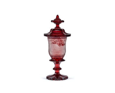 A Bohemian ruby-flashed goblet and cover, third quarter 19th century, engraved with a bear hunting scene, 45.5cm high   This 