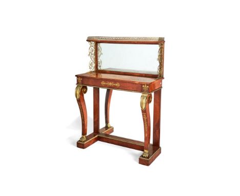 ϒ A Regency amboyna, rosewood crossbanded and gilt-brass mounted pier table, circa 1815, the raised mirror panel back with a 