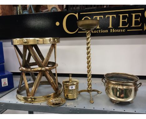 A circular brass drum table together with a brass tea caddy and other items.