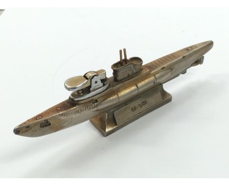A desk cigarette lighter designed as a boat U581 type V11c, sunk in the Azores in February 1942.