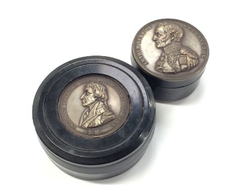 A reproduction Nelson snuff box with metal insets and a similar for Waterloo.