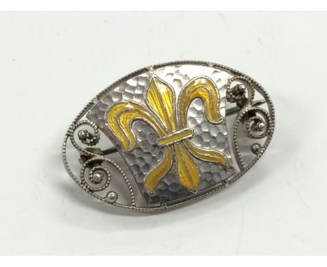 A Murrle Bennett & Co Arts & Crafts silver and enamel brooch, marked MBC950 to reverse.