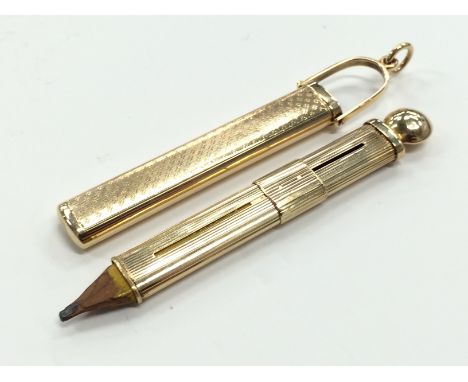A yellow metal (tested as 14ct gold) engine turned propelling pencil (14.2g)