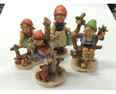 Four Hummel figures including girl on fence, girl up tree, boy on tree stump and girl with basket.