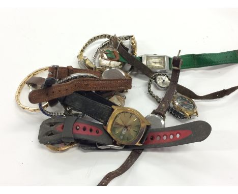 A bag of various ladies and gentleman's manual wind wristwatches.