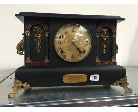 A late 19th century wood cased architectural mantle clock.