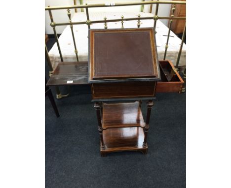 A Victorian rosewood and bone inlaid ladies writing table fitted with brush and slide single draw, turned columns resting on 