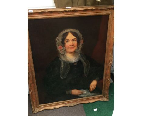 A 19th century gilt framed oil on board; Portrait of a Woman in Lace Bonnet.