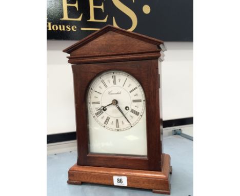 A Cavendish oak cased square mantle clock.