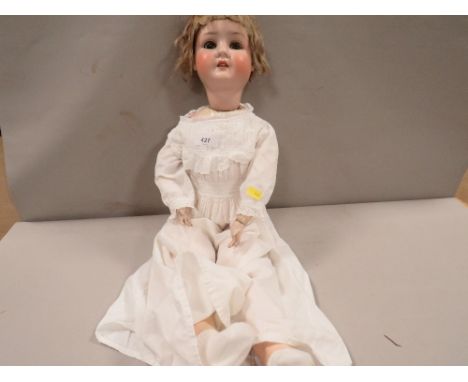 A vintage doll A/F