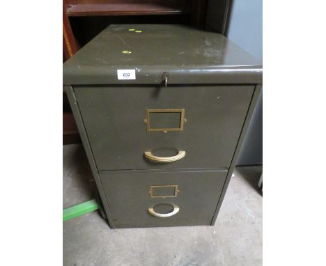 A vintage two door locking filing cabinet