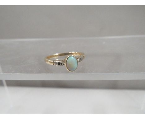 A ring set with opal marked 9ct approx. 1.6g