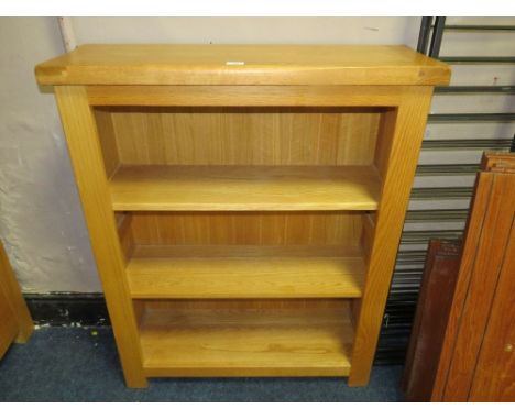 A modern light oak open bookcase H 109 cm W 89 cm
