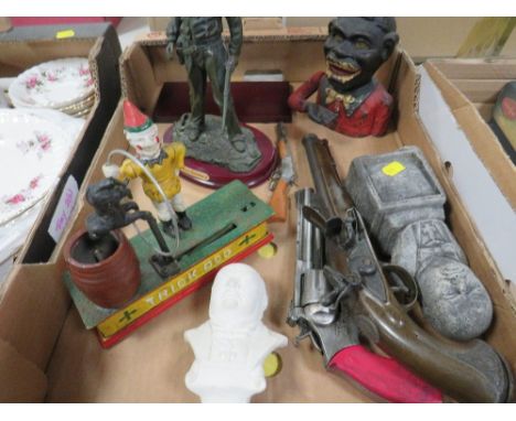 A tray of collectables to include an articulated money box Notice from the the-saleroom.com: These items are listed on the ba