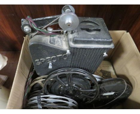 A vintage Specto film projector and reels of film