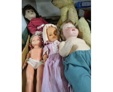 A tray of vintage dolls