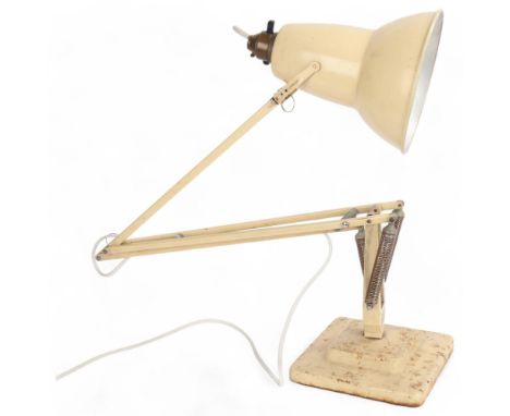 A Vintage Herbert Terry cream anglepoise lamp, with two step base, makers mark to stem, height approx 90cm . Condition Report