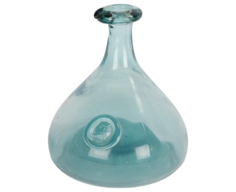 A mid 20th century Holmegaard Viking carafe by OLE WINTHER, pale green glass with applied viking face, height 22cm . Conditio