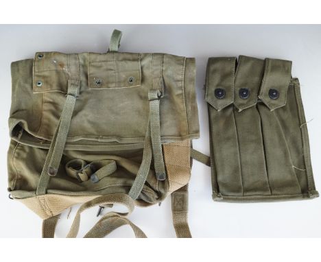 A Vietnam period US Marine Corps field pack and a US Army webbing magazine pouch