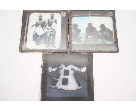 Three Victorian magic lantern photographic slides depicting Zulus and Sudan Campaign Mahdist clothing etc 