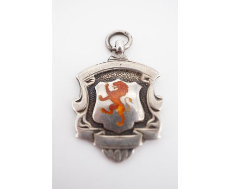 An enamelled silver watch chain fob medallion, decorated in depiction of a lion rampant, Birmingham, 1919, 3 cm