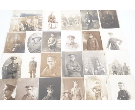A large quantity of Great War photographic and military portrait postcards. (59, all illustrated)