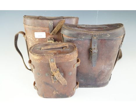 A Great War British Army binoculars case (a/f) together with two Second World War British military binoculars cases