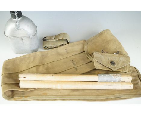 A Second World War US army water bottle, webbing and tent pole