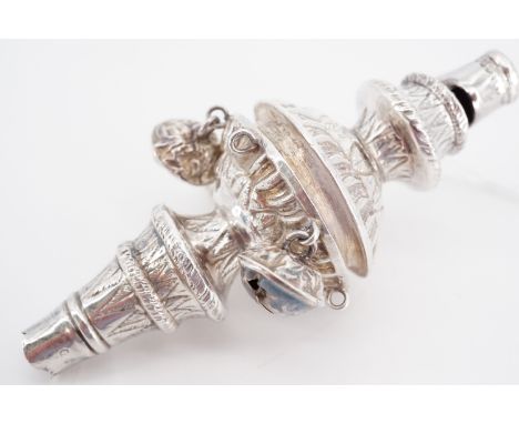 A Victorian child's silver soother incorporating a whistle and crotal bells, Birmingham, 1878, 10 cm