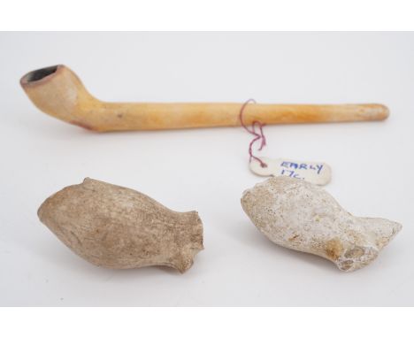 Two 16th / 17th Century clay pipe bowls and a pipe