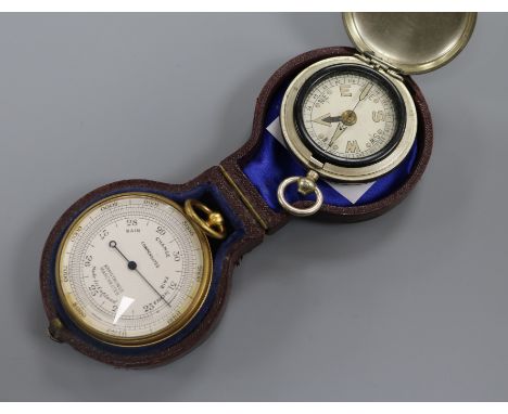 A pocket barometer by Armstrong, Manchester, cased and a nickel cased 'watch' type pocket barometer (2)