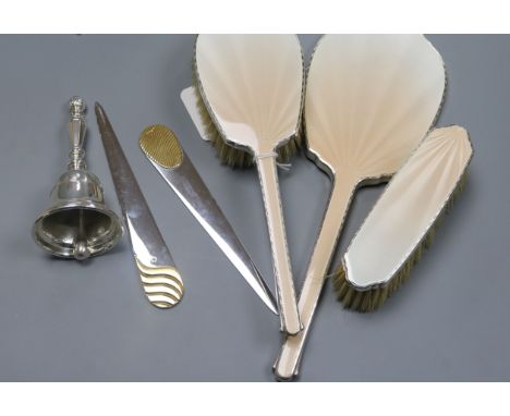 A four-piece silver and guilloche enamel dressing table set, a table bell and two letter openers