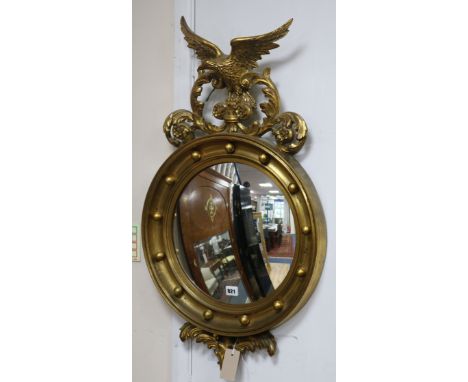 A Regency style gilt framed convex wall mirror H.84cm