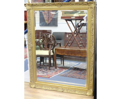 A large Victorian style gilt framed wall mirror