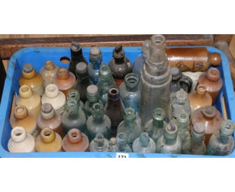 A quantity of ceramic and glass bottles