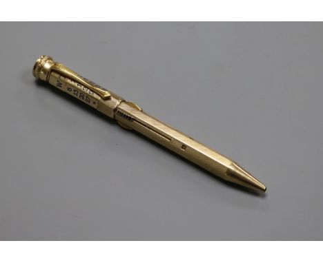 An early 20th century 9ct gold and enamel cased Jurna multi propelling calendar pencil, 12.8cm.