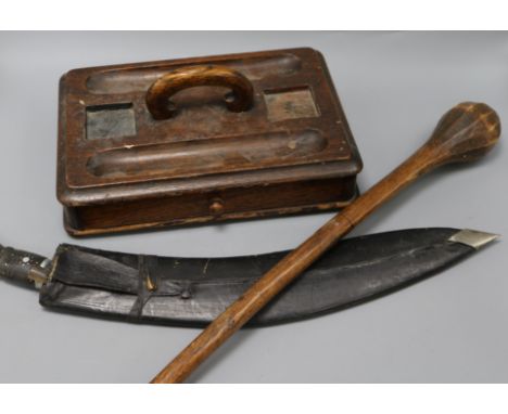 A knobkerrie, Victorian oak desk stand and a Kukri