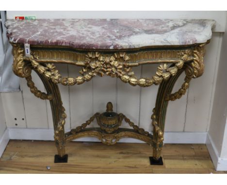 A Louis XV painted parcel gilt console table W.130cm