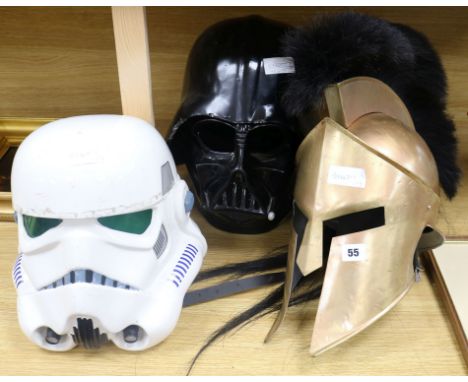 A Darth Vader helmet, Storm Trooper helmet and Roman helmet