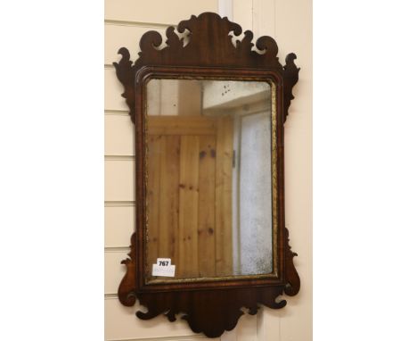 A Georgian style mahogany fret cut wall mirror H.73cm