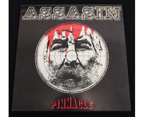 PINNACLE - ASSASSIN - A great UK prog monster LP from 1974 released on Stag Music Record (HP. 12 S). The record is in great E