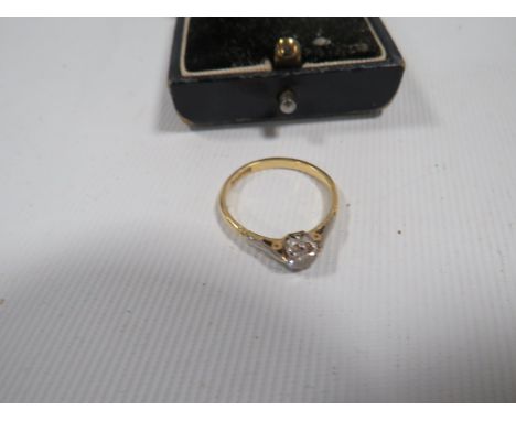 A 18CT AND PLAT SOLITAIRE GEMSET RING size P ½,  approx weight 2.7g