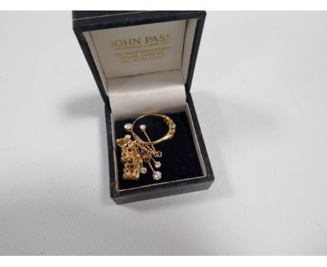 A PAIR OF 9 CARAT GOLD GEM SET EARRINGS HALLMARKED TO POSTS TOGETHER WITH A YELLOW METAL RING AND ANOTHER PAIR OF EARRINGS