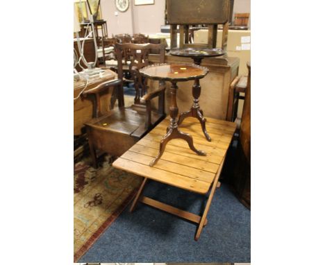 AN ANTIQUE COMMODE TOGETHER WITH TWO WINE TABLES AND A FOLDING TABLE