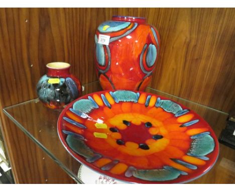 A COLLECTION OF THREE MODERN POOLE POTTERY TO IN VOLCANO PATTERN DISH DIAMETER 25CM